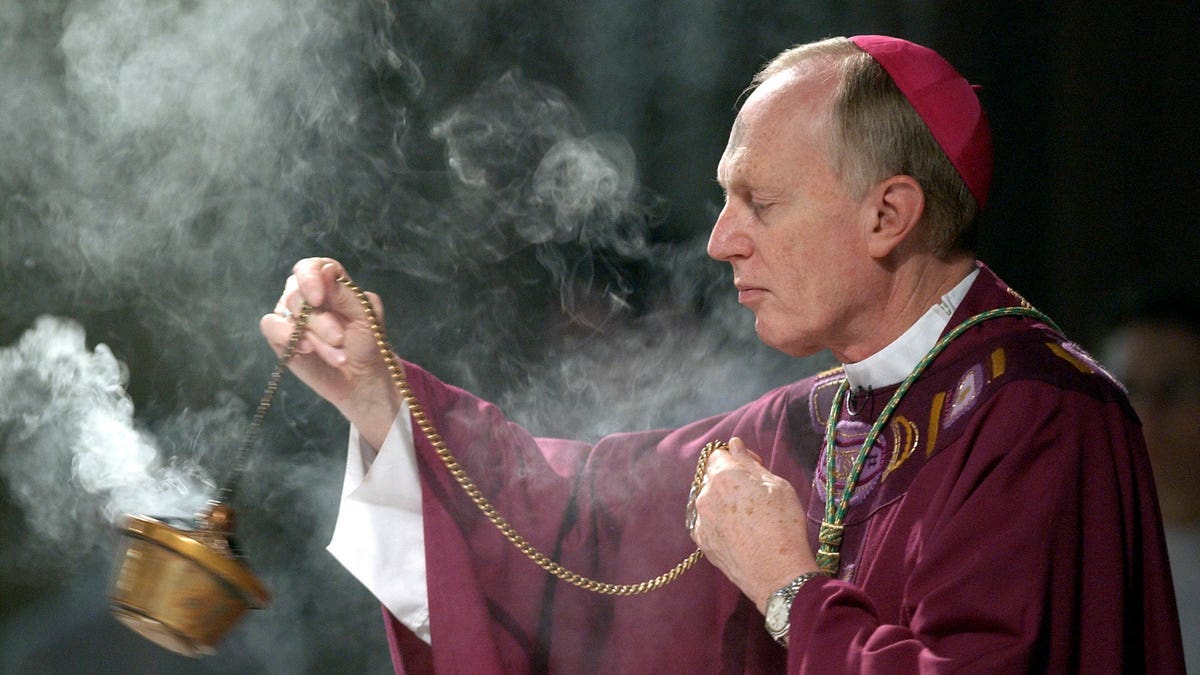 Bishop carrying incense
