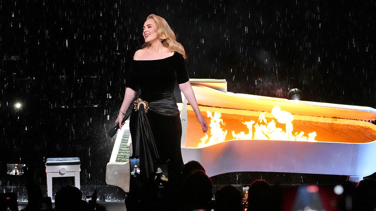 Adele Las Vegas performance piano on fire