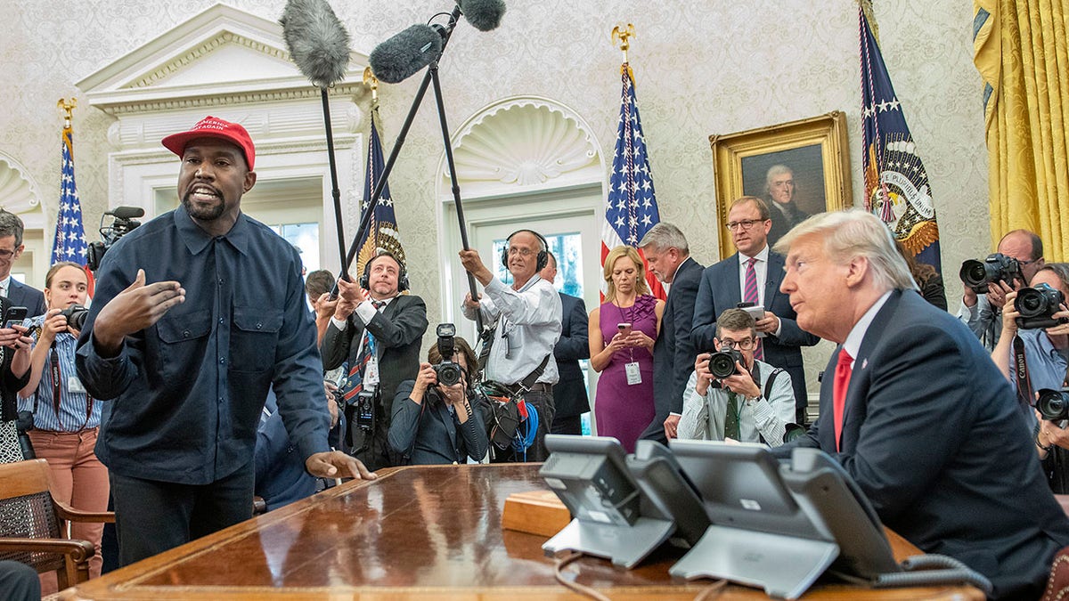 Kanye wears MAGA hat in Oval Office meeting with Trump