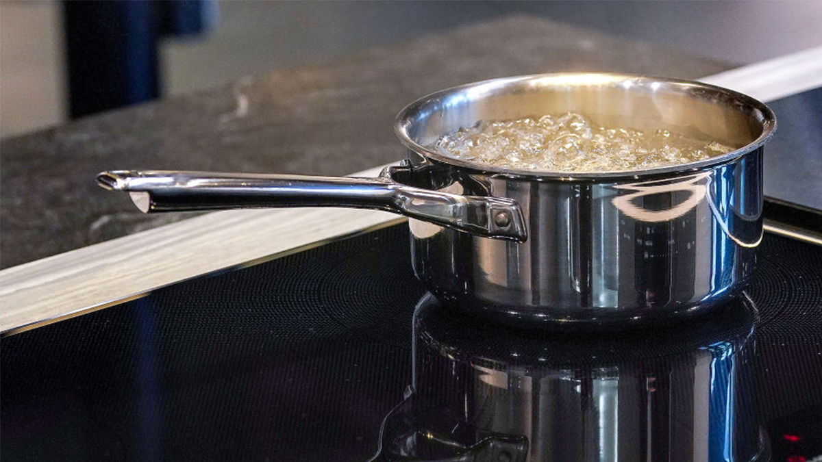 boiling water on a stove