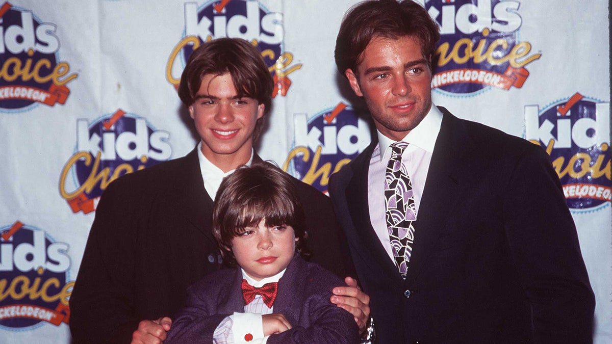 Joey Lawrence poses with his brothers Matthew and Andrew in 1996