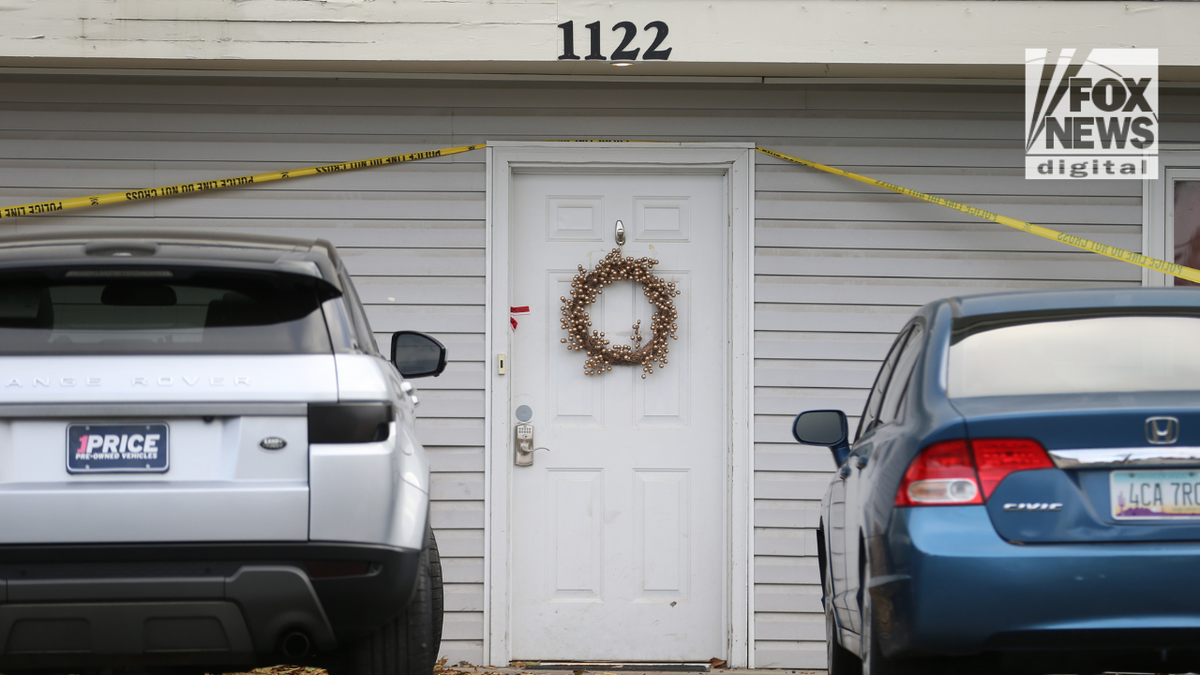 Investigators search a home in Moscow, Idaho, on Nov. 14, 2022, after four University of Idaho students were killed there on Nov. 13.