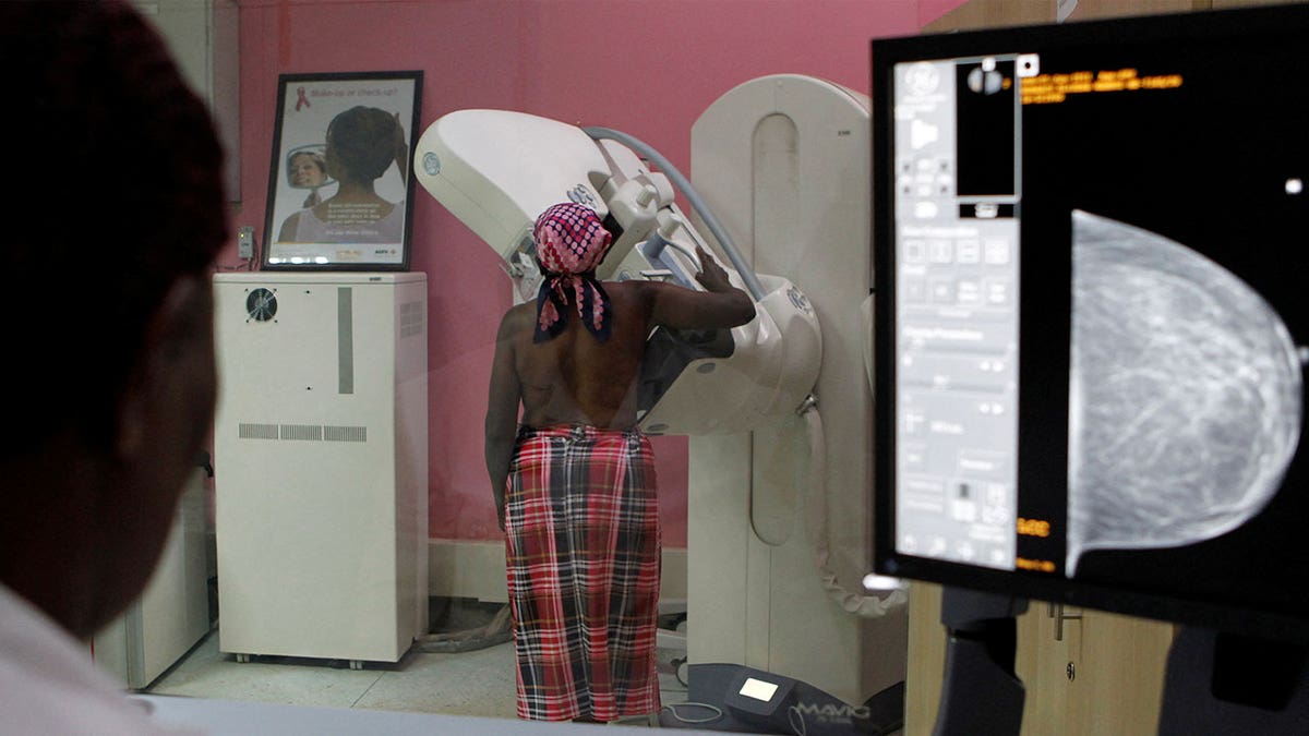 Woman undergoing a breast cancer screening test