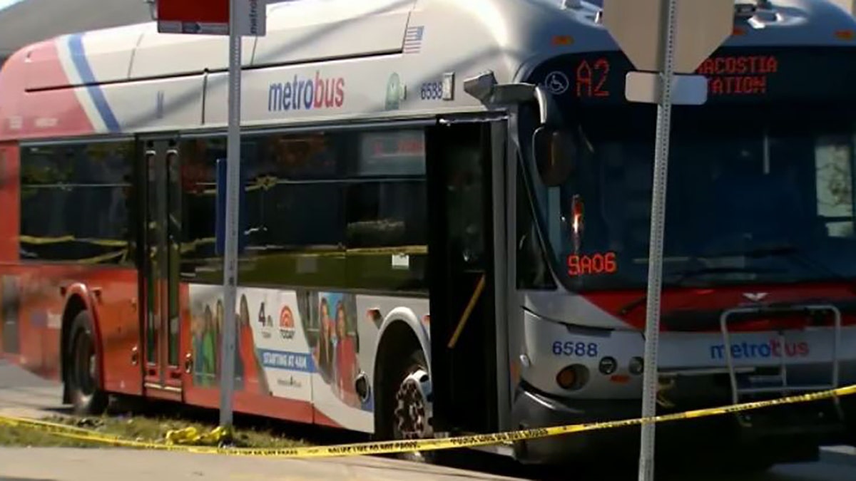 crime scene tape around bus