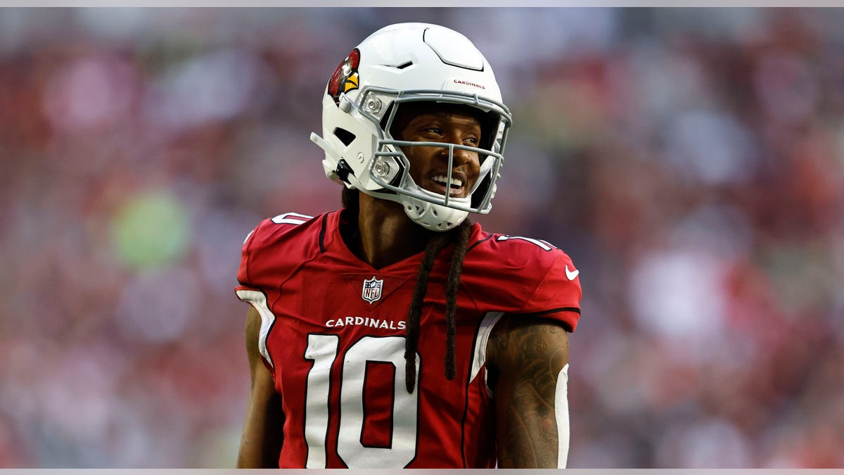 DeAndre Hopkins smiles on field