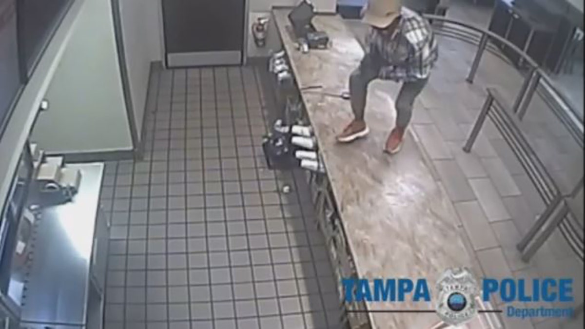 suspect jumps onto counter