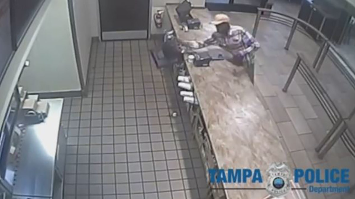 suspect knocks over register