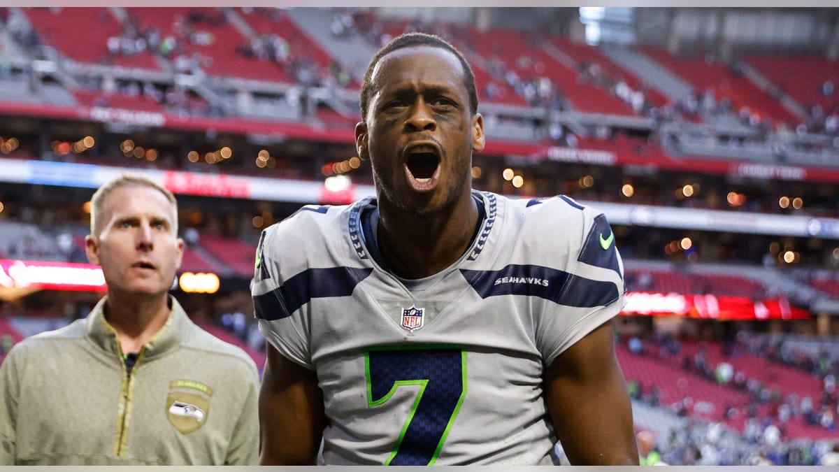 Geno Smith reacts after a win