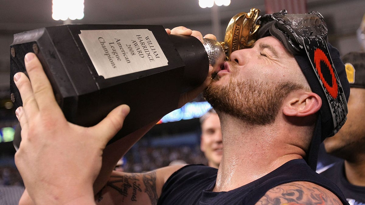 Jonny Gomes celebrates 2008 pennant