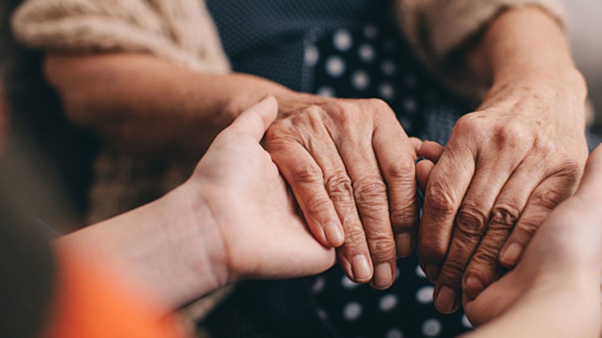 grandma grandchild hold hands