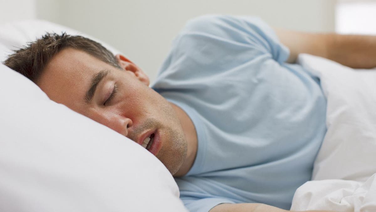 Man sleeps with mouth open