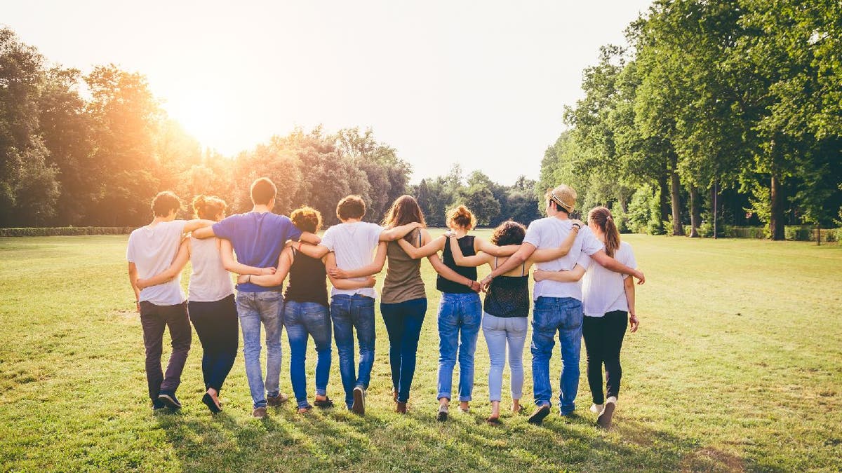 Group of friends with arms around each other