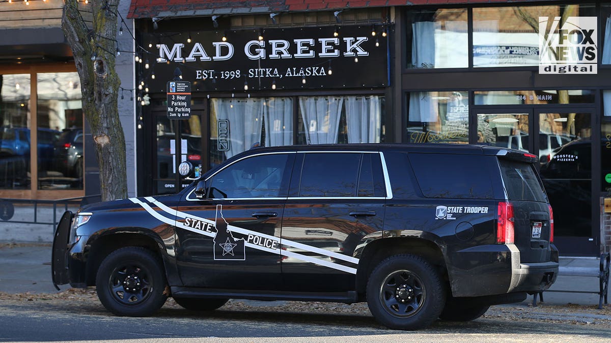 Patrol car parked outside Mad Greek Restaurant following University of Idaho murders