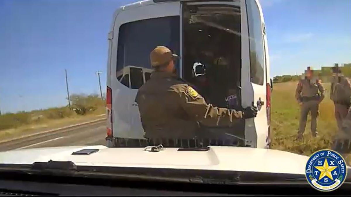 DPS trooper opens back of van