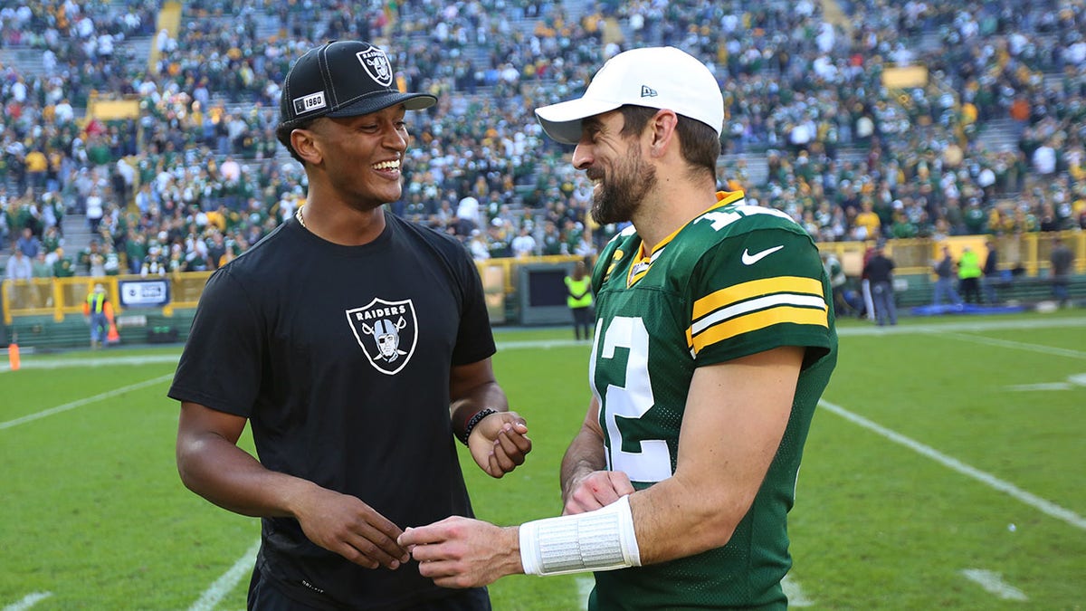 Deshone Kizer and Aaron Rodgers before game