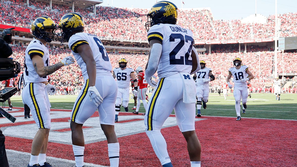 Michigan players celebrate TD 