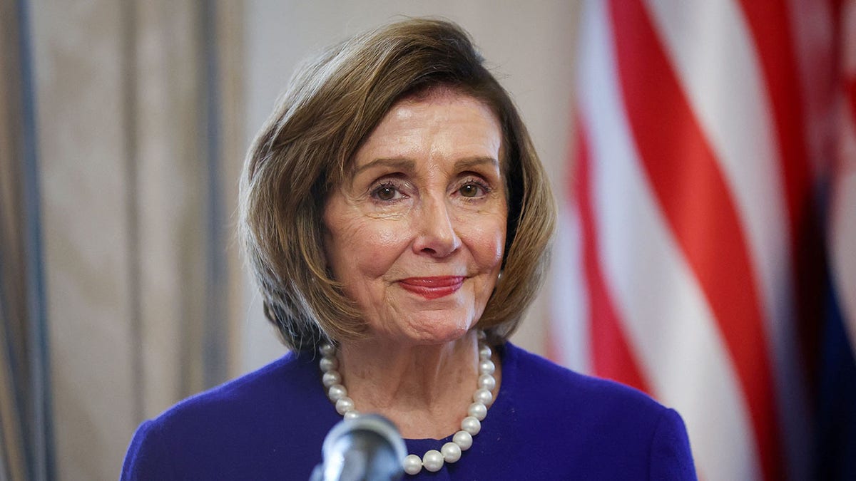 Nancy Pelosi smiling