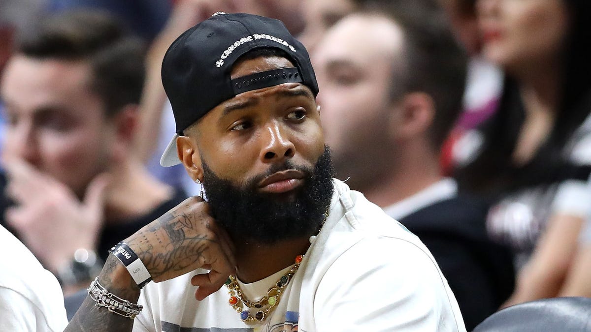 Odell Beckham Jr. sits courtside