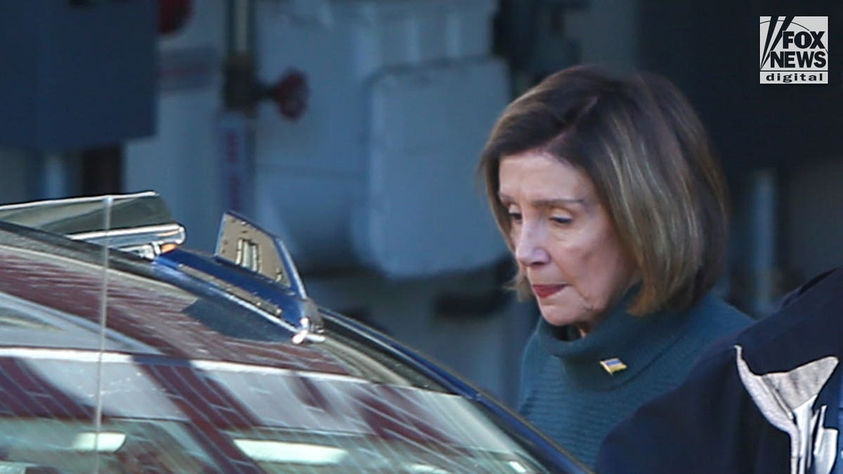 Nancy Pelosi leaves her San Francisco home
