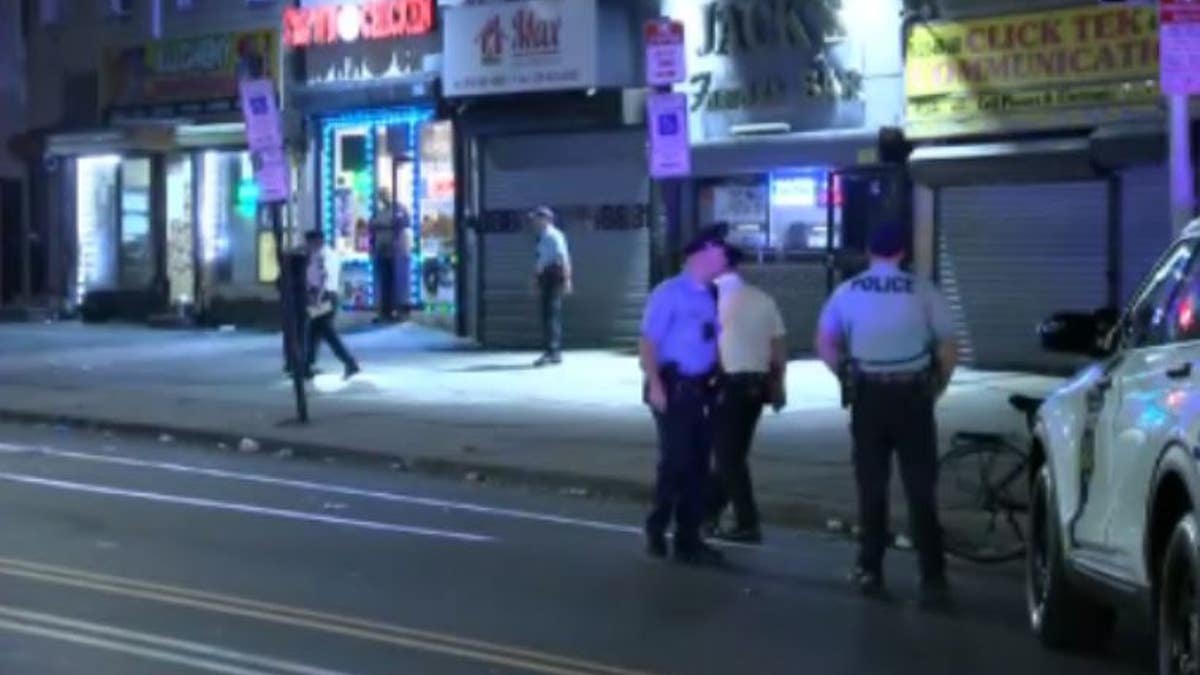 Police officers outside a business