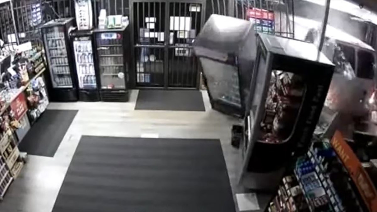 Thieves steal ATM after crashing van into store, start fire trying to open  machine: police