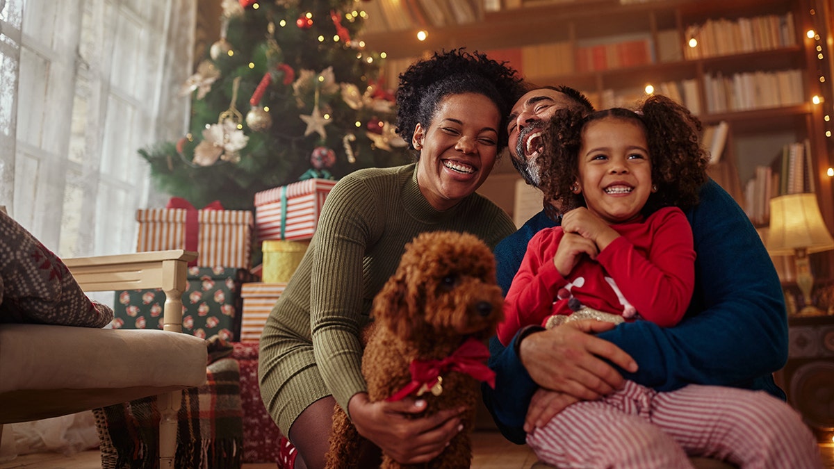 family with puppy for Christmas