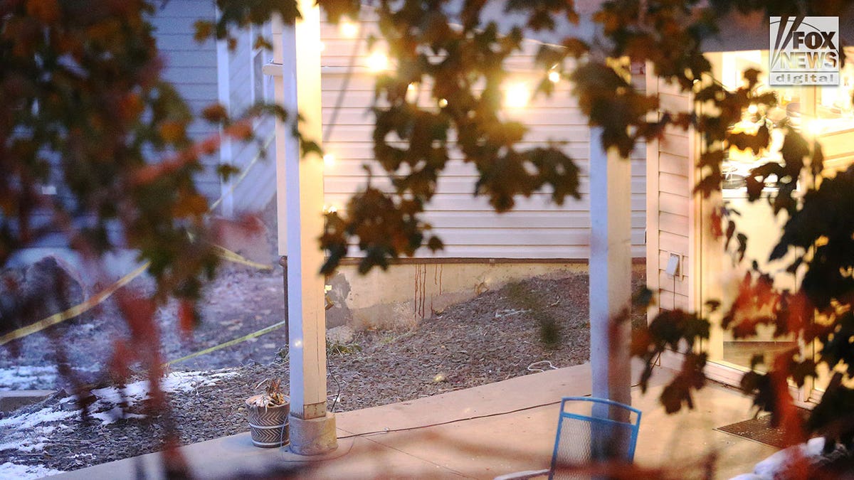 Red stains running down the foundation of a house where four college students were murdered in Moscow, Idaho. 