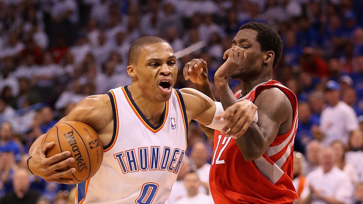 Russell Westbrook and Patrick Beverley tangled up