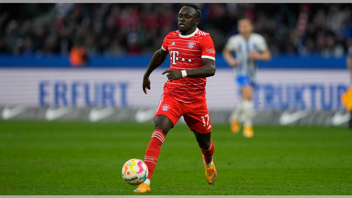 Sadio Mane dribbles ball