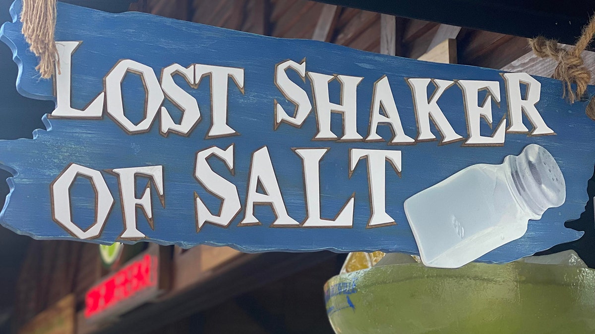 "Lost Shaker of Salt" sign at bar in Margaritaville