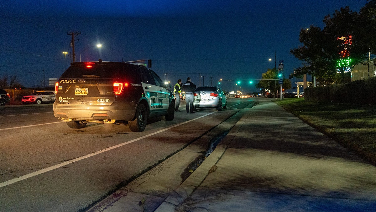 police officers on scene on carjacking