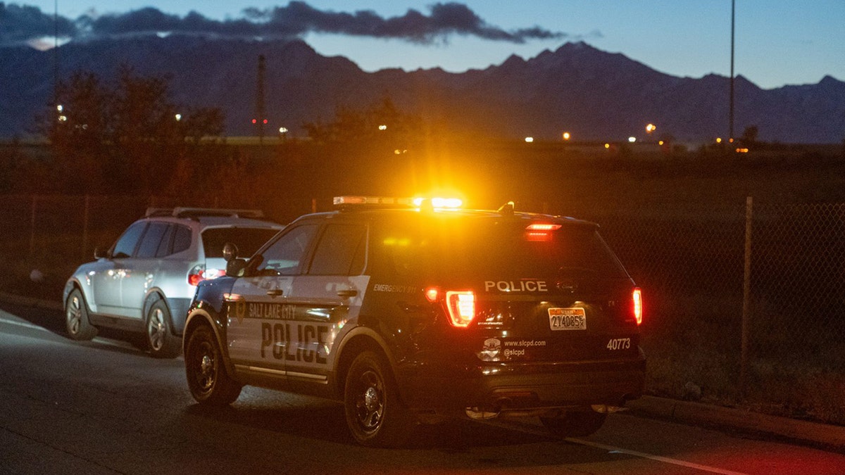 police vehicle investigating scene of carjacking