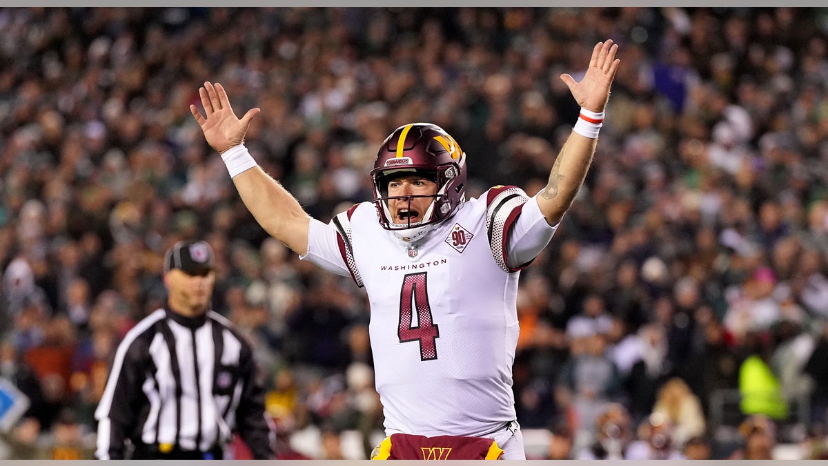 Taylor Heinicke reacts to touchdown