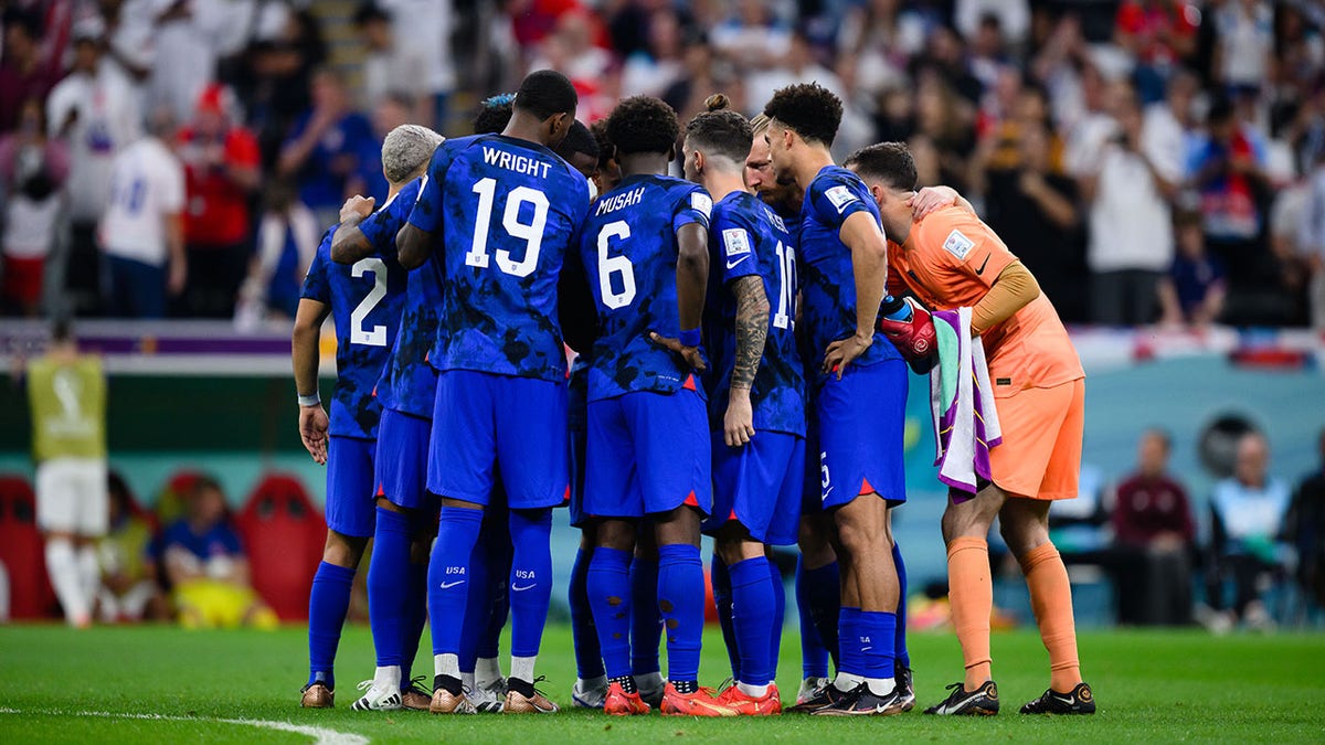 Team USA huddles