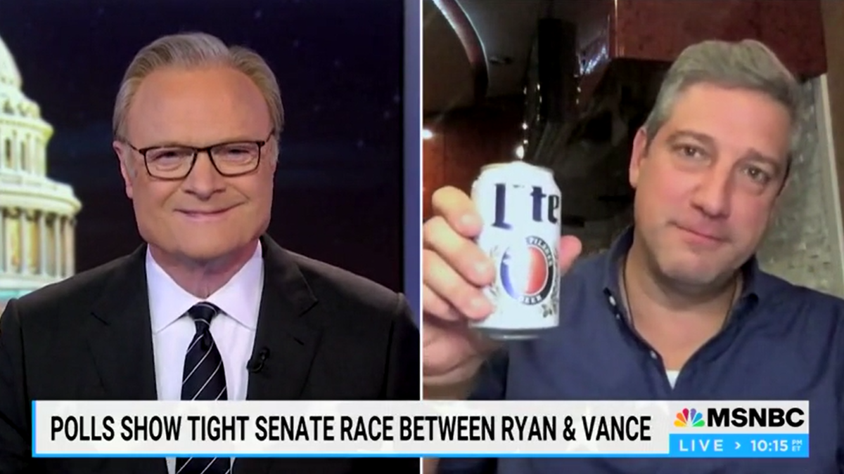 Tim Ryan holds beer can