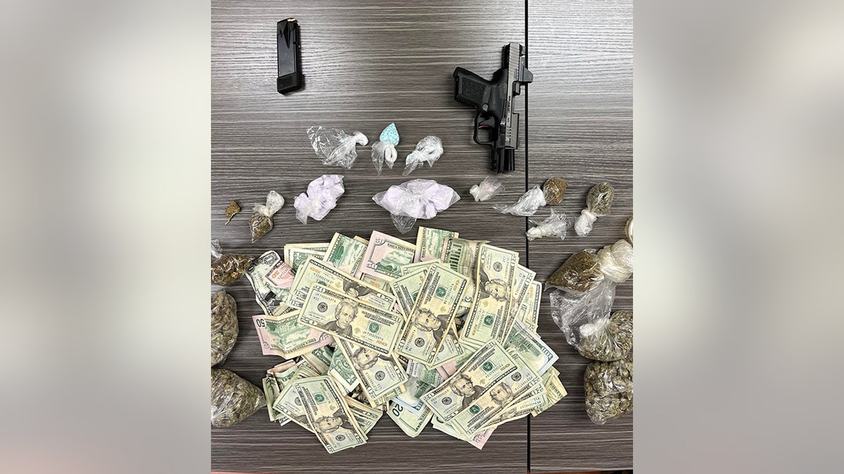 money, drugs and gun