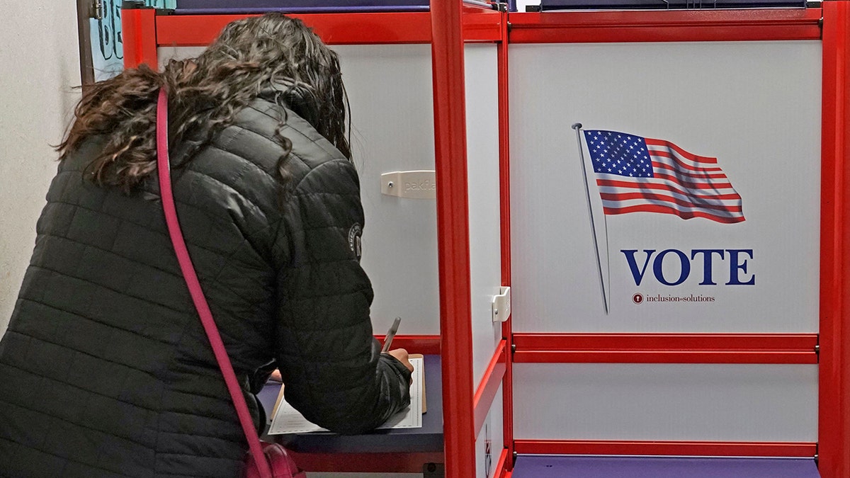 Woman voting in Utah