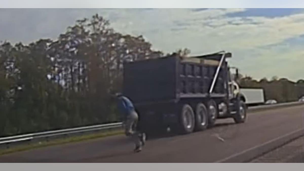 Video shows Zachary Sibert running across traffic