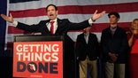 Sen. Marco Rubio, left, R-Fla., celebrates with his family as he talks to supporters during an Election Night party, Tuesday, Nov. 8, 2012, in Miami. (AP Photo/Wilfredo Lee)