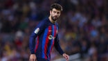 Gerard Pique looks onto the field