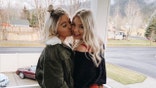 Kaylee Goncalves and Madison Mogen pose outside