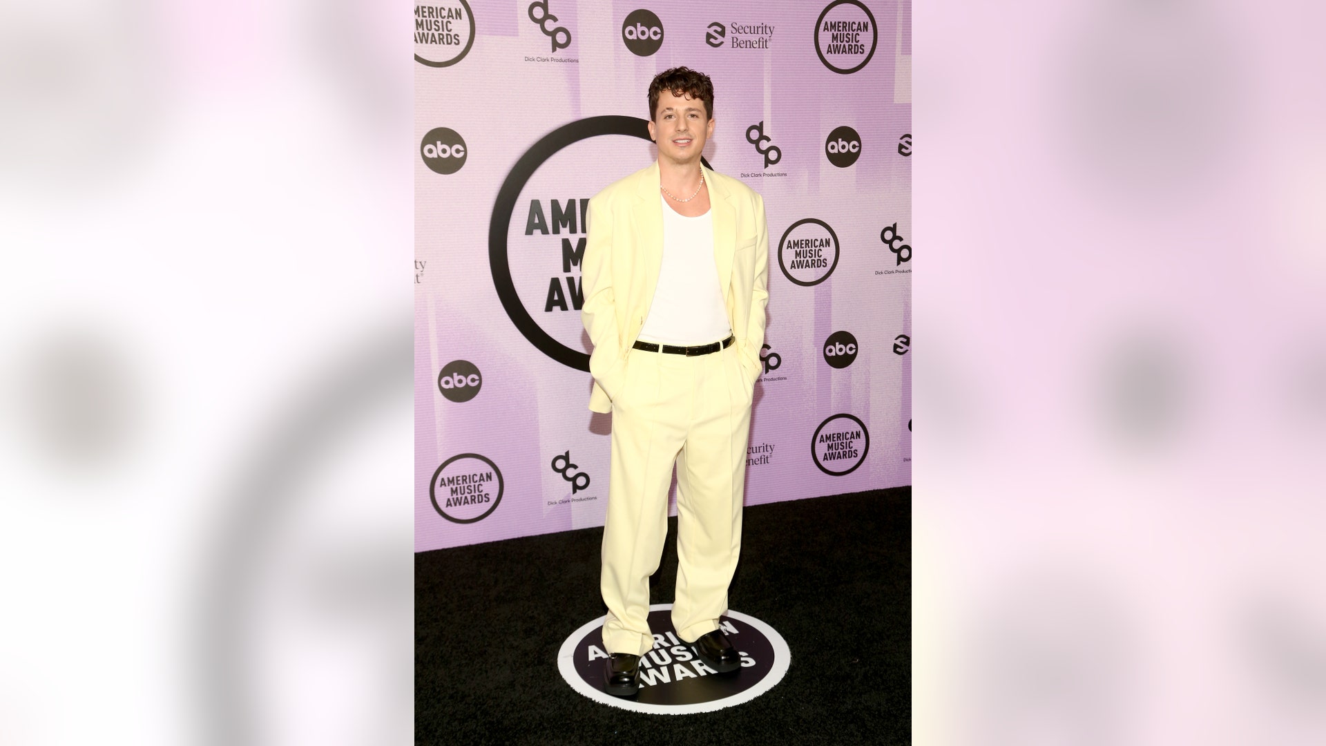 Charlie Puth sports yellow jacket and pants at AMAs