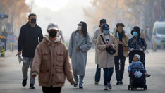 China confirms 1st COVID-19 death since May as authorities try to clamp down on rising cases