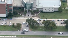 Texas police say two dead in shooting at Dallas County Medical Examiner's Office
