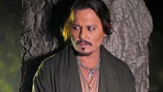 Johnny Depp appears in Rihanna's Savage X Fenty fashion show
