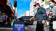 Los Angeles COVID cases surge, but county holds off on mask mandate