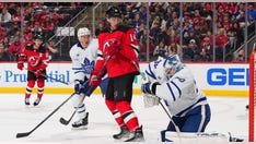 Devils fans launch beer cans on ice after NHL referees call back third New Jersey goal