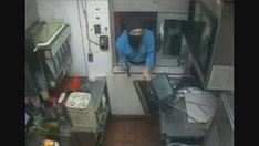 Armed robber at Philadelphia McDonald's yanks cash register out drive-thru window, video shows