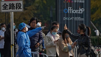 Residents clash with Chinese authorities over 'zero-COVID' rules