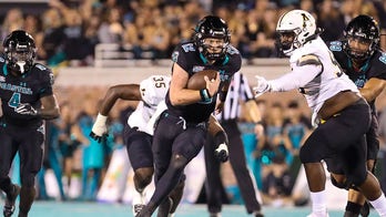 At least 5 hurt after Coastal Carolina crowd storms field following upset win over Appalachian State